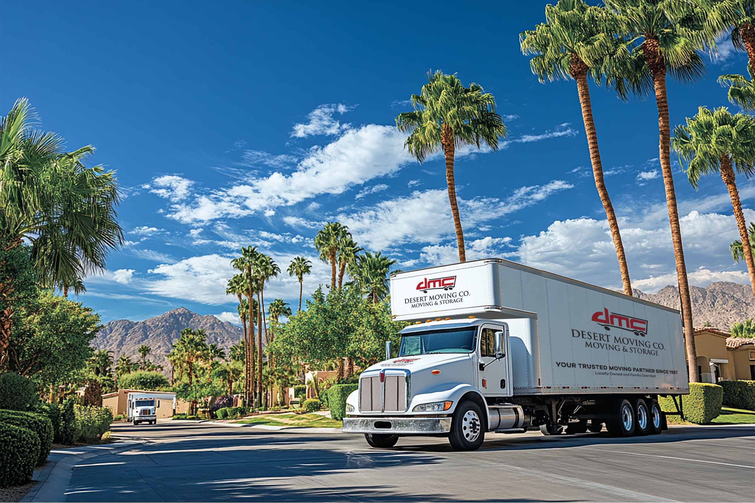 Two Desert Moving branded trucks driving through Palm Springs neighborhood